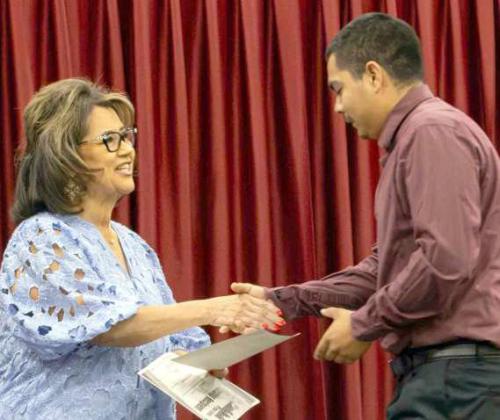Jimmy Ramos receives the $1,000 band scholarship at the Littlefield High School Scholarship Awards Ceremony on May 20, 2025. Ramos additionally received the Hillcrest Funeral Home scholarship. (Photo by Madison Vidales)