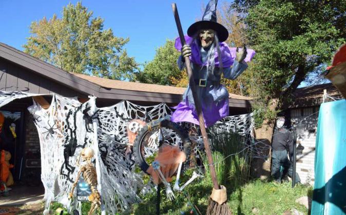 The floating witch is one of the new editions to the Halloween Spooktacular yard of Kenny Williams and his wife, Granny Katz this year. (Staff Photo by Samantha Pontius)