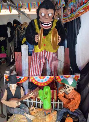 The symbal clapping monkey is also one of the new editions to the Halloween Spooktacular yard of Kenny Williams and his wife, Granny Katz this year. (Staff Photo by Samantha Pontius)