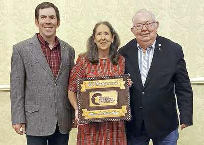American Shorthorn Association honors Mary Hinton Bass, center, of Olton, Texas, as a 2023 Shorthorn Heritage Award Winner. (Photo courtesy of American Shorthorn Association)