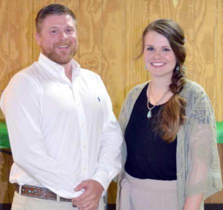 EXTENSION AGENTS THANKED – The Littlefield 4-H Club presented a special appreciation gift to the two Extension Agents, who have been working with the 4-H members and their leaders, with their 4-H projects. The agents are Kyle Howard and Kendra Callahan. (Staff Photo by Joella Lovvorn)