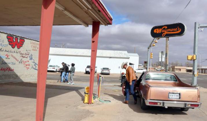 With the filming of an arrival scene completed, Charley Crockett and his film crew move on to the next scenario at Waymores in Littlefield, Tx on January 8, 2024. (Photos by Ann Reagan)
