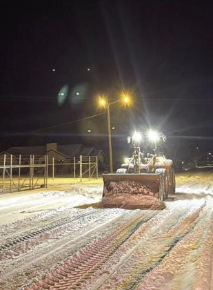 City of Littlefield crews worked vigorously to clear roadways in front of Littlefield EMS, so that first responders would be able to work safely when needed, during the Winter storm this past weekend. (Submitted Photo)