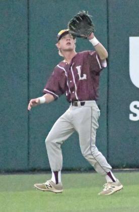 FLY OUT – Littlefield left fielder, Turner Heffington, tracks down and catches a fly ball in left field for the out, during game one of the Wildcats’ Class 3A Regional Semi-Final Series with Brock on Thursday. (Staff Photo by Derek Lopez)