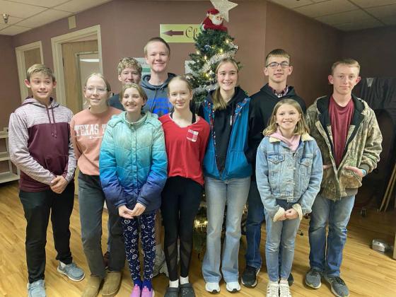Littlefield 4-H had a couple of community service projects this month. Littlefield 4-H collected 76 cans of food for the Isaiah 58 Food Ministry and also decorated patient doors for Christmas at the Lamb Healthcare Center.(L to R): Ty Carr, Charlie Burt, JT Burt, Ezri Jobe, Jaden Burt, Lilli Burt, Kealee Bussey, Grant Muller, Imri Jobe, and Ryan Muller. (Submitted Photo)