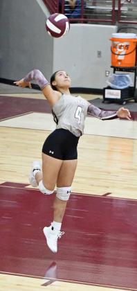 Littlefield’s Alyssa Torres deliveres a serve, during the first set of the Lady Cats’, 3-0, victory over the Lubbock Titans to open the 2024 season at Wildcat Gymnasium on Tuesday. (Staff Photo by Derek Lopez)