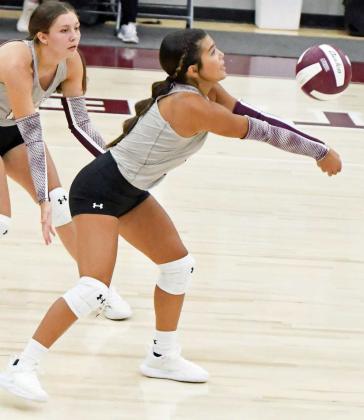 Littlefield’s Cali Saldana bumps a ball up in the air, as the Lady Cats look to go on the attack, during the third set of the Lady Cats’, 3-0, victory over the Lubbock Titans to open the 2024 season at Wildcat Gymnasium on Tuesday. (Staff Photo by Derek Lopez)