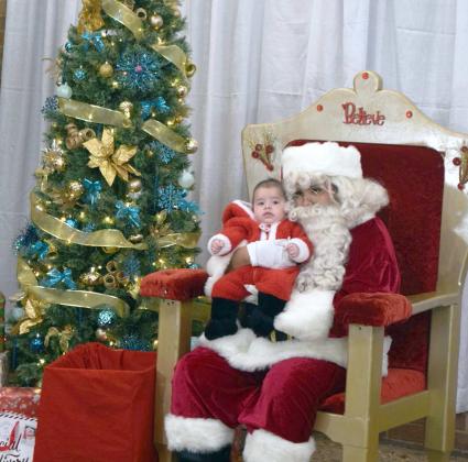 Santa meets his “Mini Me” at the Photos with Santa event held at Lamb Healthcare Center on Tuesday, December 6, 2022. (Photo by Ann Reagan)