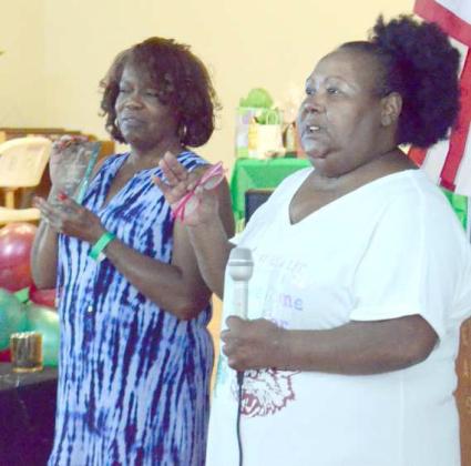Joyce Griffiths (right) presented the award for starting the scholarship fund to Gracie Brockington-Young. Unfortunately, Brockington-Young was not in attendance, so Cynthia Greene (left) accepted the award on her behalf.