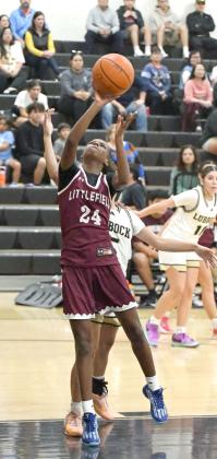 Littlefield freshman, Amoni Jefferson, goes up for a lay-up, during the second half of the Lady Cat’s road victory over Lubbock High on Tuesday. (Staff Photo by Derek Lopez)