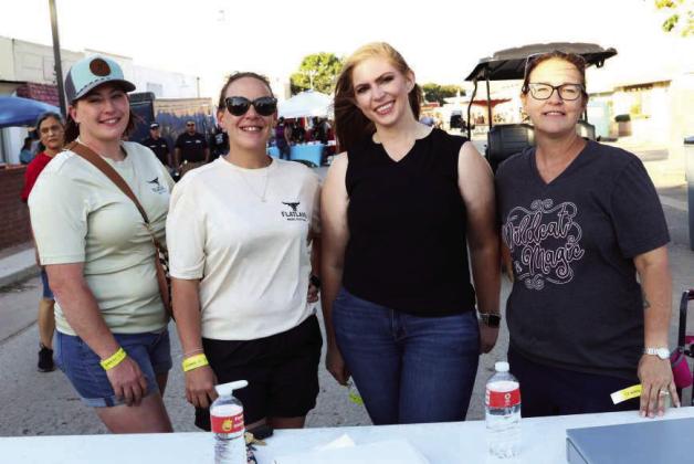 Flatland Festival Committee members Jacie Anstead, Sha Wilson, Kami Jones, and Janet Gloy greeted guests at the gate during the evening show downtown Littlefield, Tx on Saturday, October 4, 2025. (Photo by Ann Reagan)