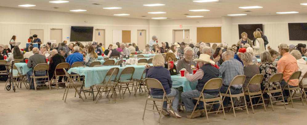 Community members enjoy fish plates at Bob Edward’s 16th annual Fish Fry. (Photo by Madison Vidales)