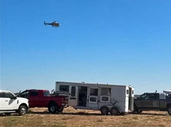 A Texas DPS helicopter during the raid of Carril Mochomos on Sunday. (Credit: Isaac Leyva)