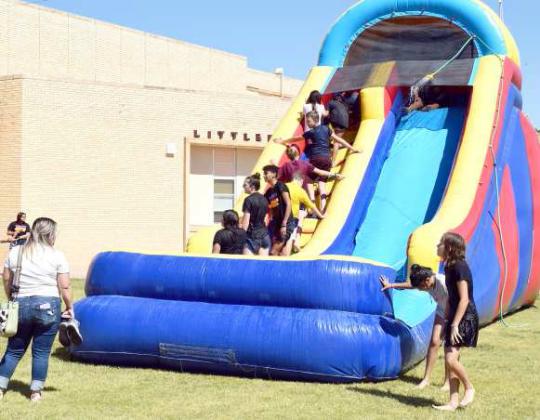 Nothing like a water slide to cool off at the Wildcat Band Block Party fundraiser, on Saturday, August 19, 2023 held between the Junior High Building and the Primary Building.