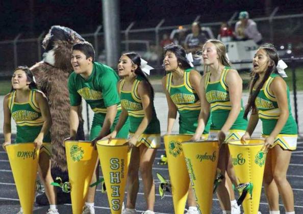 The Springlake-Earth Cheerleaders cheer on the Wolverines, during the second half of the Wolverine’s, 40-35, loss to Petersburg on Friday at Buffalo Stadium. (Photo by Hannah Alvarez)