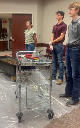 The FFA Skills Teams performed their program for the board Thursday night. They spoke on the history of irrigation as demonstrated how to install a sprinkler system. They will be performing at 8:30 at WT on Saturday in the area round competition. (L to R): Maggie McNeese, Ky Hays and Craig Jennings. (Submitted Photo)