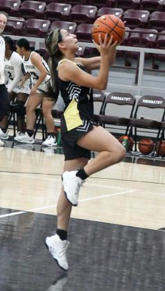 Sudan’s Melo Rodriguez, scores a lay-up on the fast-break, during the second quarter of the Nettes’ tournament-opener against Muleshoe on Thursday in Abernathy. (Staff Photo by Derek Lopez)