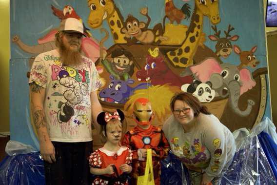 Littlefield family poses for a picture at the Hillcrest Funeral Home Trunk or Treat on Oct. 31. (Staff Photo by Rhode Duenas)