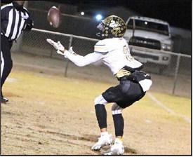 Sudan senior receiver, Jaibryn Ornelas, catches a wide open pass, for a huge gain, during the Hornets, 36-14, district victory over Ralls on the road Friday night. (Staff Photo by Derek Lopez)
