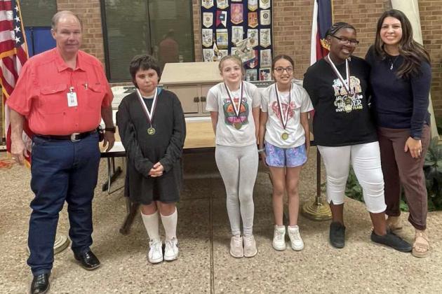 ROTARY FIFTH GRADE MOST IMPROVED REASONERS - Olivia Miles, Aliyah Gonzales, Vivian Loya and Echo Rivera, shown with Judge Mike DeLoach and Rotary President-Elect Lori Zinn. (Submitted Photo)
