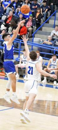 PULLING UP – Olton junior guard, Jake Soliz (2), pulls up for a jumper in the lane over the Farwell defense, during the first half of the Mustangs’, 68-64, road victory over the Farwell Steers on Friday, which earned Olton the District Title. (Staff Photo by Derek Lopez)