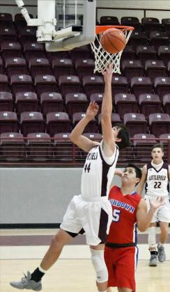 POINTS IN THE PAINT—Littlefield senior forward, Chris Brown (44), drops in a lay-up under the basket, during the first half of the Wildcats’ victory over Sundown on Tuesday at Wildcat Gym. (Staff Photo by Derek Lopez)