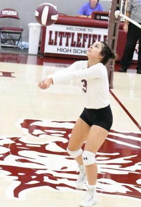 LOOKING TO SCORE - Littlefield’s Lady Cat, Bri Valdez, bumps a ball up into the air, as the Lady Cats look to go on the attack, during their, 0-3 loss to Ropes at Wildcat Gym on Tuesday. (Staff Photo by Derek Lopez)
