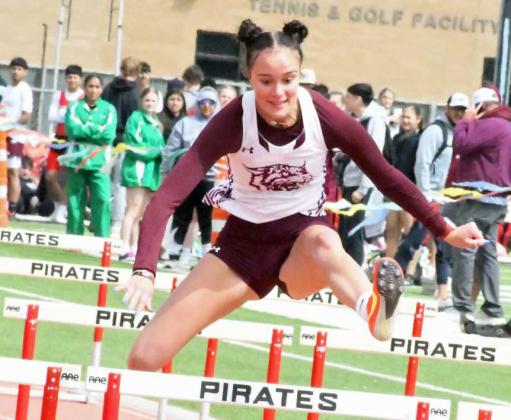 Littlefield’s Kealee Bussey, competes in the women’s 100-meter hurdles at the District Track meet at Lubbock-Cooper on Thursday. (Staff Photo by Derek Lopez)