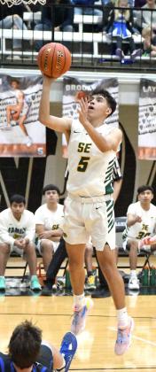 UP FOR TWO - Springlake-Earth senior, Alex Alvarez, drops in a lay-up, during the second half of the Wolverines’ 1A Bi-district loss to the Wildorado Mustangs on Tuesday at Canyon Randall. (Staff Photo by Derek Lopez)