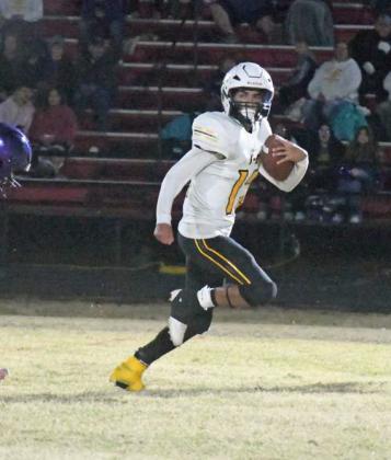 Springlake-Earth senior tailback, JJ Jaramillo, breaks loose on a 50-yard touchdown run, during the second quarter of the Wolverines’, 42-34, Area round loss to Miami on Friday at Motley County. (Staff Photo by Derek Lopez)