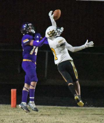 Springlake-Earth defensive back, Froylan Agundiz, breaks up a pass in the end zone, during the second half of the Wolverines’, 42-34, Area round loss to Miami on Friday at Motley County. (Staff Photo by Derek Lopez)