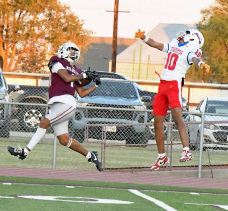 Littlefield’s Jayden Barrio, catches a 36-yard touchdown pass from Sammy Saenz, to open the scoring on Friday, during the Wildcat’s, 35-21, victory over Coahoma at Wildcat Stadium. (Staff Photo by Derek Lopez)
