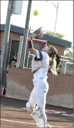 Littlefield catcher, Hannah Lopez, catches a bunt that was popped up behind the plate for an out, during the Lady Cats’, 10-1, Bi-district loss to the Bushland Lady Falcons in Plainview on Thursday. (Staff Photo by Derek Lopez)