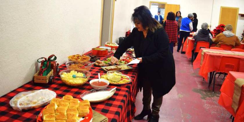 Guests of the City of Amherst indulged in a variety of delicious dishes at the Christmas Open House held Wednesday, December14, 2022. (Photo by Ann Reagan)