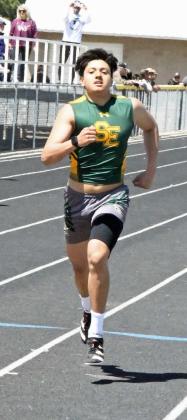 AREA RUNNER-UP - Springlake-Earth’s Dadwin Perez, finishes second in the men’s 400-meter dash with a time of 55.58, qualifying him for the Region I-1A Regional Track Meet at South Plains College next week. (Staff Photo by Derek Lopez)