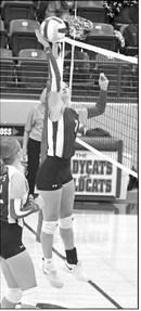 Olton’s Taryn Smith sends a hit over the net, during the second set of the Fillies Littlefield Tournamentopening victory last Thursday. (Staff Photo by Derek Lopez)