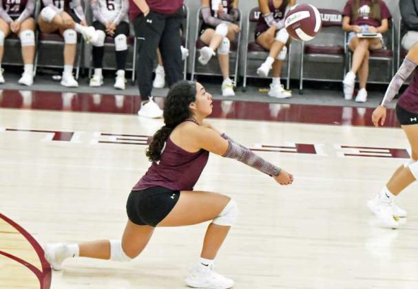 Littlefield junior, Tailyn Gomez, bumps the ball up into the air, as the Lady Cats look to go on the offensive, against Lamesa on Tuesday at Wildcat Gymnasium. Littlefield swept both Dimmitt and Lamesa in the dual. (Staff Photo by Derek Lopez)