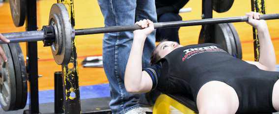 Sudan’s Trinity Love throws up 105 lbs on bench press at their Powerlifting Meet in Sudan against New Home and Ropes. (Staff Photo by Derek Lopez)