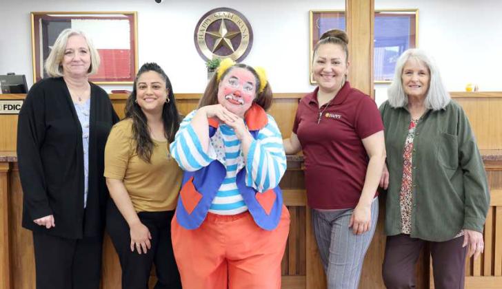 Cindy Russell, Yolanda LaFuente, Skeeter the Clown, Carla Canchola, and Sharon Bigby, employees of Happy State Bank, who is acting as one of our ticket outlets for the circus on April 13th. (Photo Courtesy of Olton Chamber of Commerce)
