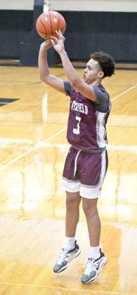 Littlefield junior guard, Ryan Williams, fires up a three from the left elbow, during the second half of the Wildcats’, 89-16, victory over Post on the road on Monday. (Staff Photo by Derek Lopez)