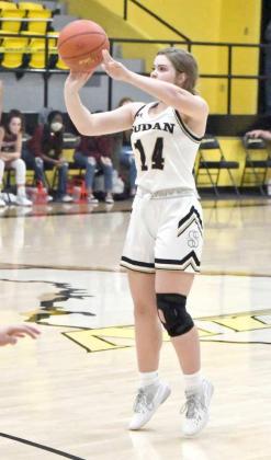 FIRINGFROM RANGE — Sudan sophomore, Sydnie Cornelius, shoots a three from the top of the key, during the second half of the Nettes’ overtime loss to Abernathy on Tuesday, 63-55. (Staff Photo by Derek Lopez)