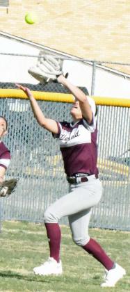 Littlefield senior center fielder, Cali Saldana, runs up and makes a catch for an out in shallow center field, during the Lady Cats’, 14-6, victory over the Lady Eagles on Monday. (Staff Photo by Derek Lopez)