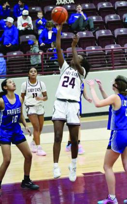 Littlefield’s Amoni Jefferson, gets into the paint for a lay-up, during the first half of the Lady Cats Wildcat Classic Championship victory over Farwell last Wednedsay at Wildcat Gym. (Staff Photo by Derek Lopez)