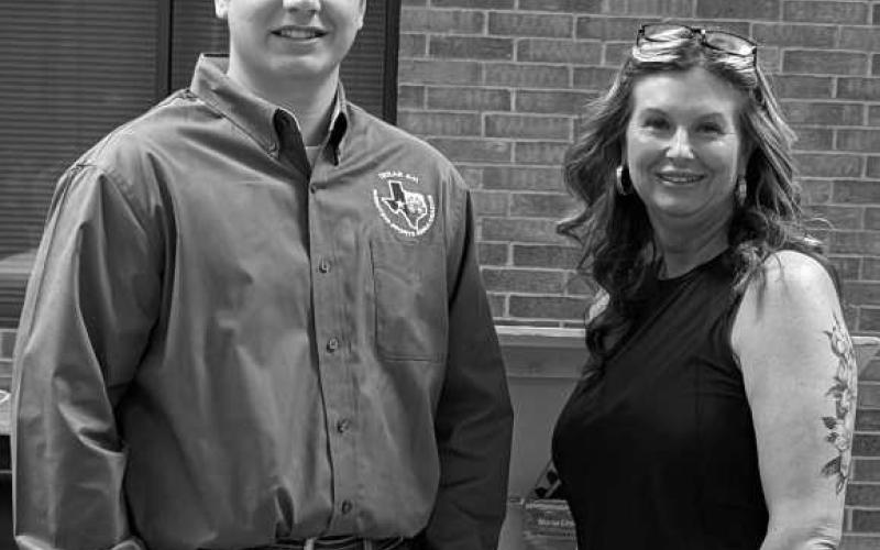 Certified State Student Ambassador for the 4-H Shooting Sports Program, Reese Moore, poses with Littlefield Rotary Club President Bree Clark on March 19, 2026. (Photo courtesy of Littlefield Rotary Club)