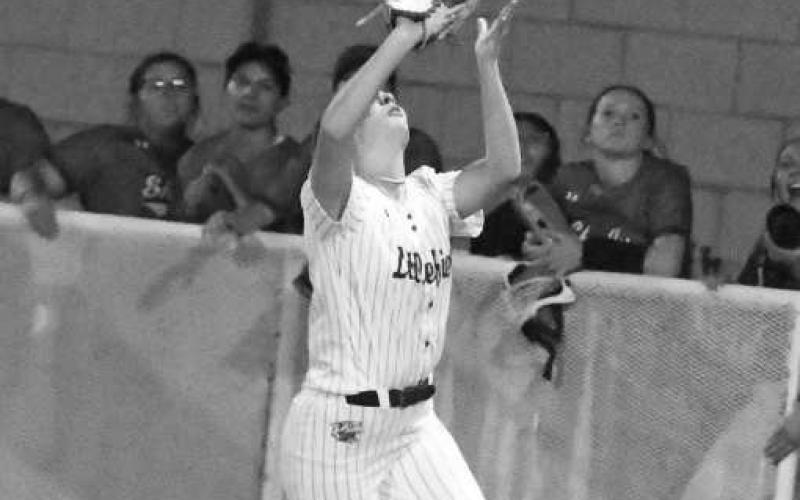 Littlefield’s Maggie McNeese catches a pop up in foul territory at first base to retire the side in the top of the seventh, as the Lady Cats drop the contest to Shallowater, 5-2, on Tuesday. (Staff Photo by Derek Lopez)