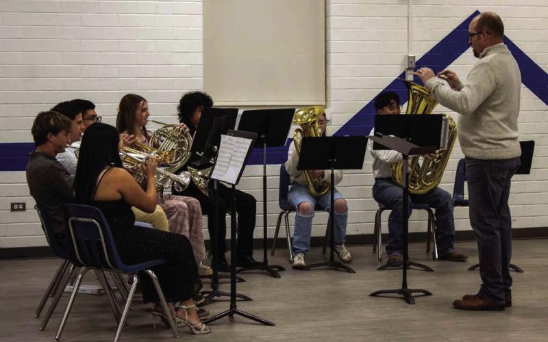 Olton High School band students, Colby Burns, Maleena Chia, Ezra Montemayor, Jaret Richardson, Hollie Beelitz, Alex Rodriguez, Jorge Angel, Hallie McCullough, Emilio Reyes and Alan Sanchez, perform “The Whaling Song” at the Olton Chamber of Commerce and Agriculture banquet on Saturday, March 7, 2026. (Photo by Madison Vidales)