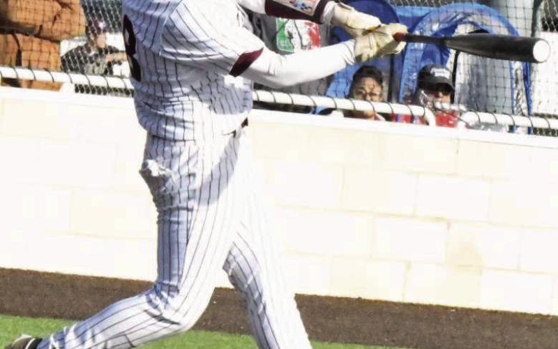 Cayson Villarreal roped an RBI-double to left-center field in the bottom of the sixth inning to give the Wildcats a, 3-2, lead, but the Wildcats would fall to the Eagles, 5-3 in their first meeting of district play on Monday. (Staff Photo by Derek Lopez)