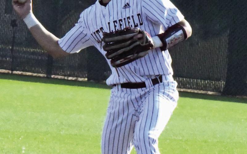 Littlefield’s Dawson Adkins fields a ground ball at second base and throws to first for an out, during the Wildcat’s, 5-3 loss to the Roosevelt Eagles on Monday at Wildcat Field. (Staff Photo by Derek Lopez)