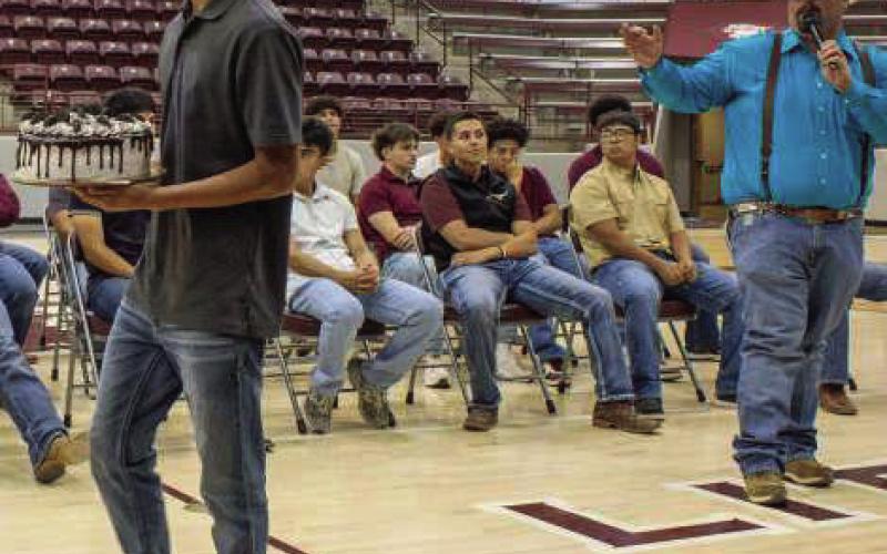 Cakes were auctioned off to the highest bidder during the annual cake auction at Littlefield High School on Wednesday, April 1st. (Photo by Madison Vidales)