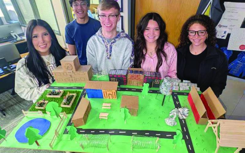 Sudan High School students Sam Baker, Max Lopez, Rylan Dugan, Emry Humphreys and Dani Mitchell show off their architecture project on March 6, 2026. (Submitted Photo)